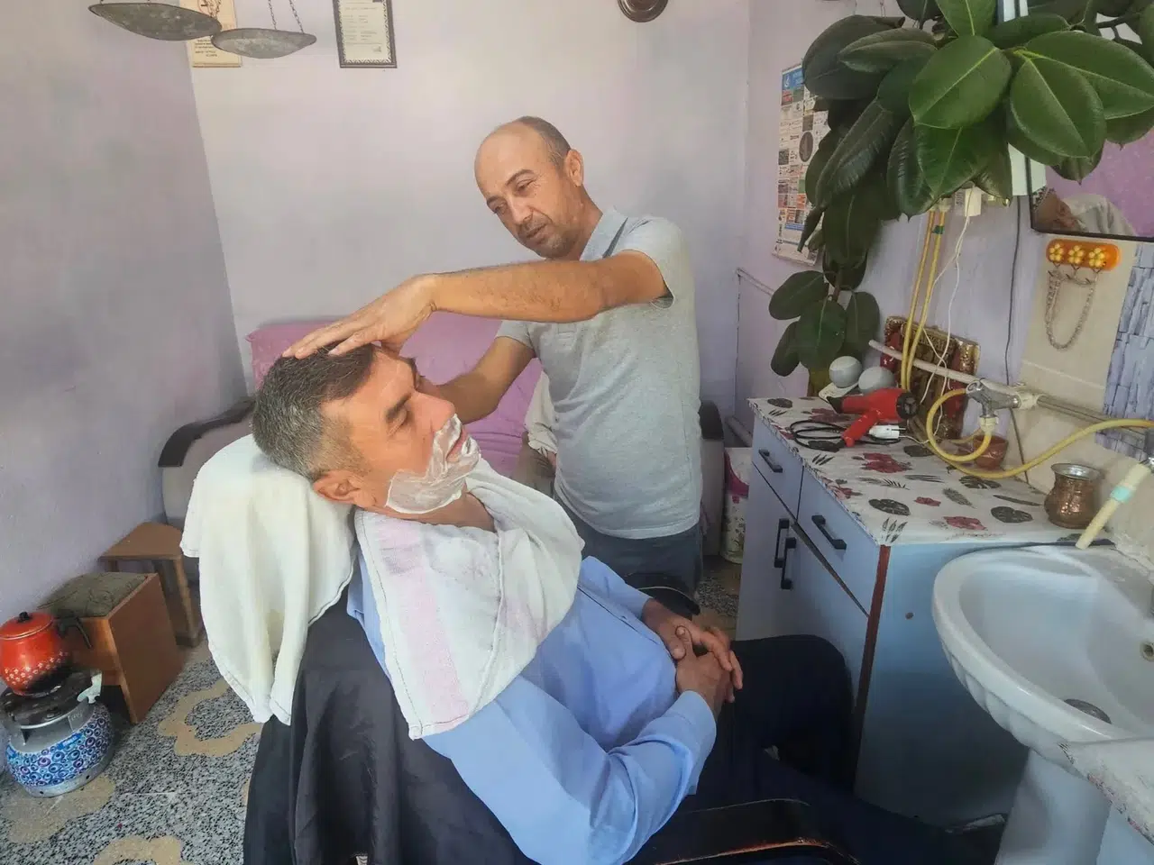 Manisalı baba oğulun 35 yıllık hizmet hikâyesi