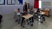 Emekli eczacıdan köy okuluna anlamlı destek