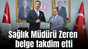 Sağlık Müdürü Zeren belge takdim etti