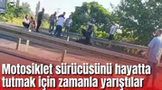 Motosiklet sürücüsünü hayatta tutmak için zamanla yarıştılar