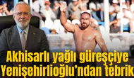 Akhisarlı yağlı güreşçiye Yenişehirlioğlu’ndan tebrik