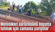 Motosiklet sürücüsünü hayatta tutmak için zamanla yarıştılar