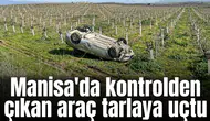 Manisa'da kontrolden çıkan araç tarlaya uçtu