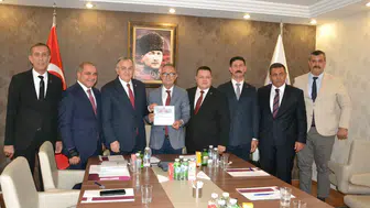 MHP heyetinden esnaf teşkilatına ziyaret