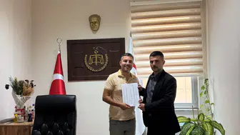 MHP Şehzadeler İlçe Başkanı Emre Taşkıran mazbatasını aldı
