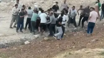 İki grup arasında taşlı sopalı meydan kavgası