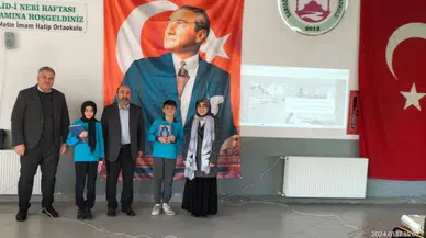 Başarılı öğrencilere Kur'an-ı Kerim hediye edildi