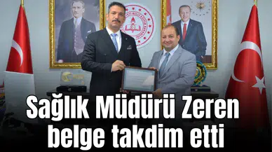 Sağlık Müdürü Zeren belge takdim etti