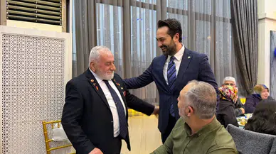 Arınç, şehit yakınları ve gazilerle iftarda buluştu