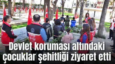Devlet koruması altındaki çocuklar şehitliği ziyaret etti